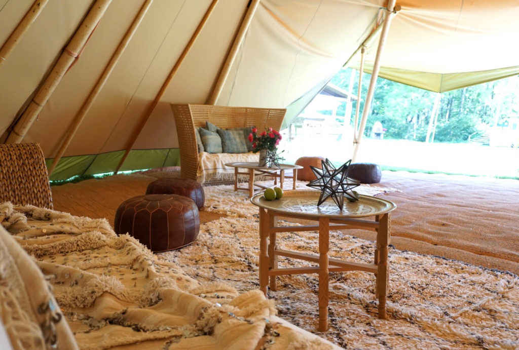 stout tent with comfortable furniture